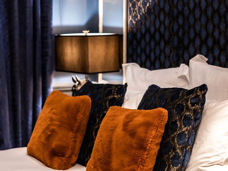 Dark Headboard Detail — Sophisticated Upholstery