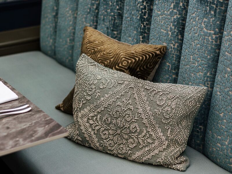 Teal Cushions Close — Detailed Stitching Work
